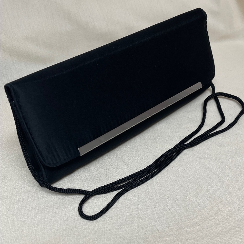 Vintage Avon Elegant Black Clutch with Metallic Detail